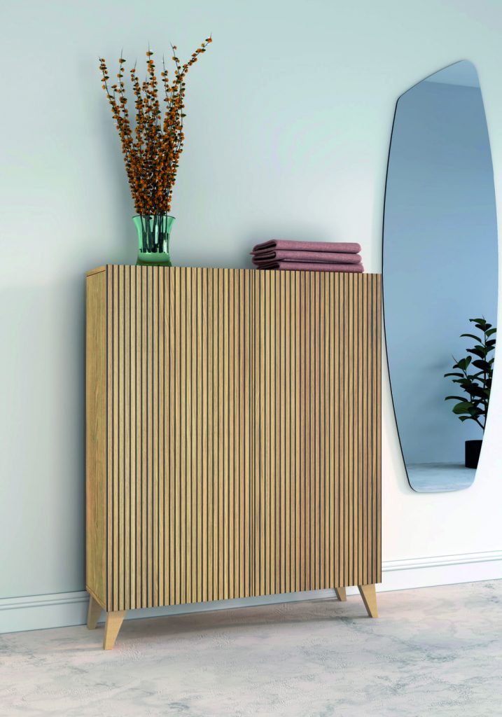 mueble recibidor decorado con plantas artificiales