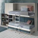 5. Un nuevo concepto de dormitorio juvenil pensado para que los más jóvenes disfruten de su propio mundo y lo compartan con amigos. Con dos camas abatibles que se pliegan en la pared, el espacio se multiplica sin renunciar al estilo. Acabado en colores Loto, Ratón, Gris Ártico, Azul Denim y Azul Ahumado. Tienda de muebles en Alcañiz 3